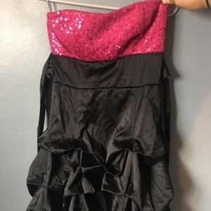 Strapless pink and black dress.